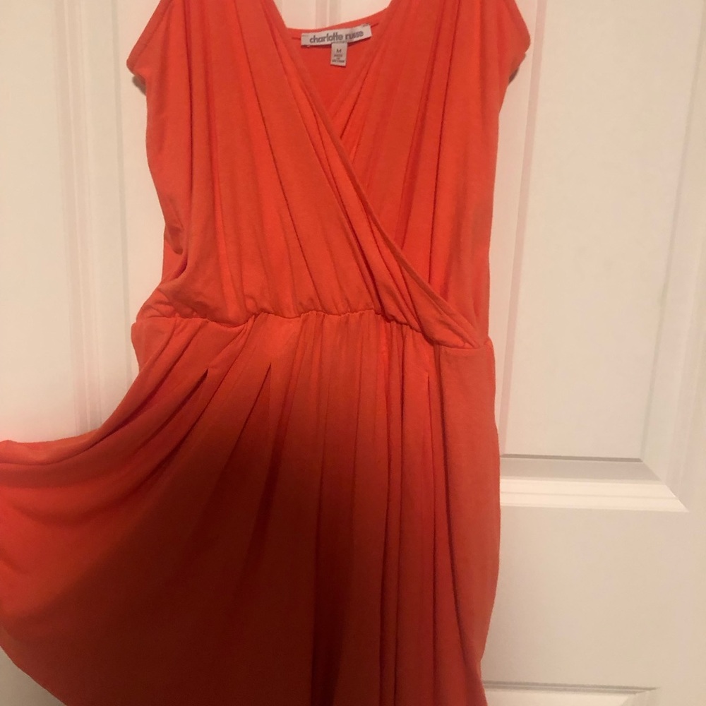 Orange/salmon romper.